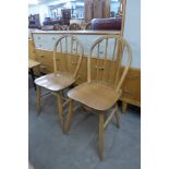 A pair of Ercol style elm and beech chairs