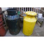 Two painted milk churns