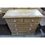 A pine chest of drawers