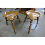 A pair of 18th Century style oak saddle stools