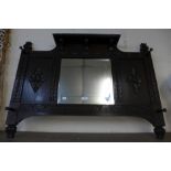 An early 20th Century carved oak hall mirror