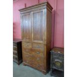 A Victorian oak housekeepers cupboard