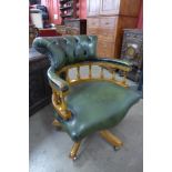 A beech and green leather revolving desk