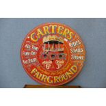 A painted Carters Fairground sign