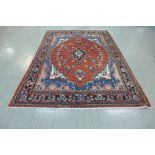 An eastern red ground rug, 300 x 208cms