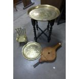 A small Chinese brass folding occasional table, small charger, doll's chair and fire bellows