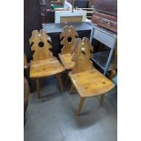 A set of three Gothic style pine chairs