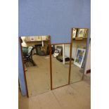 Three teak framed mirrors