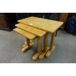 A Robert Thompson style oak nest of tables