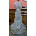 A large French Empire style gilt metal and glass bag shaped chandelier, approx. 160cms h