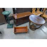 An Art Deco circular walnut effect occasional table and a mahogany blanket chest and two others