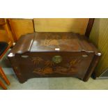 A Chinese carved camphorwood blanket box