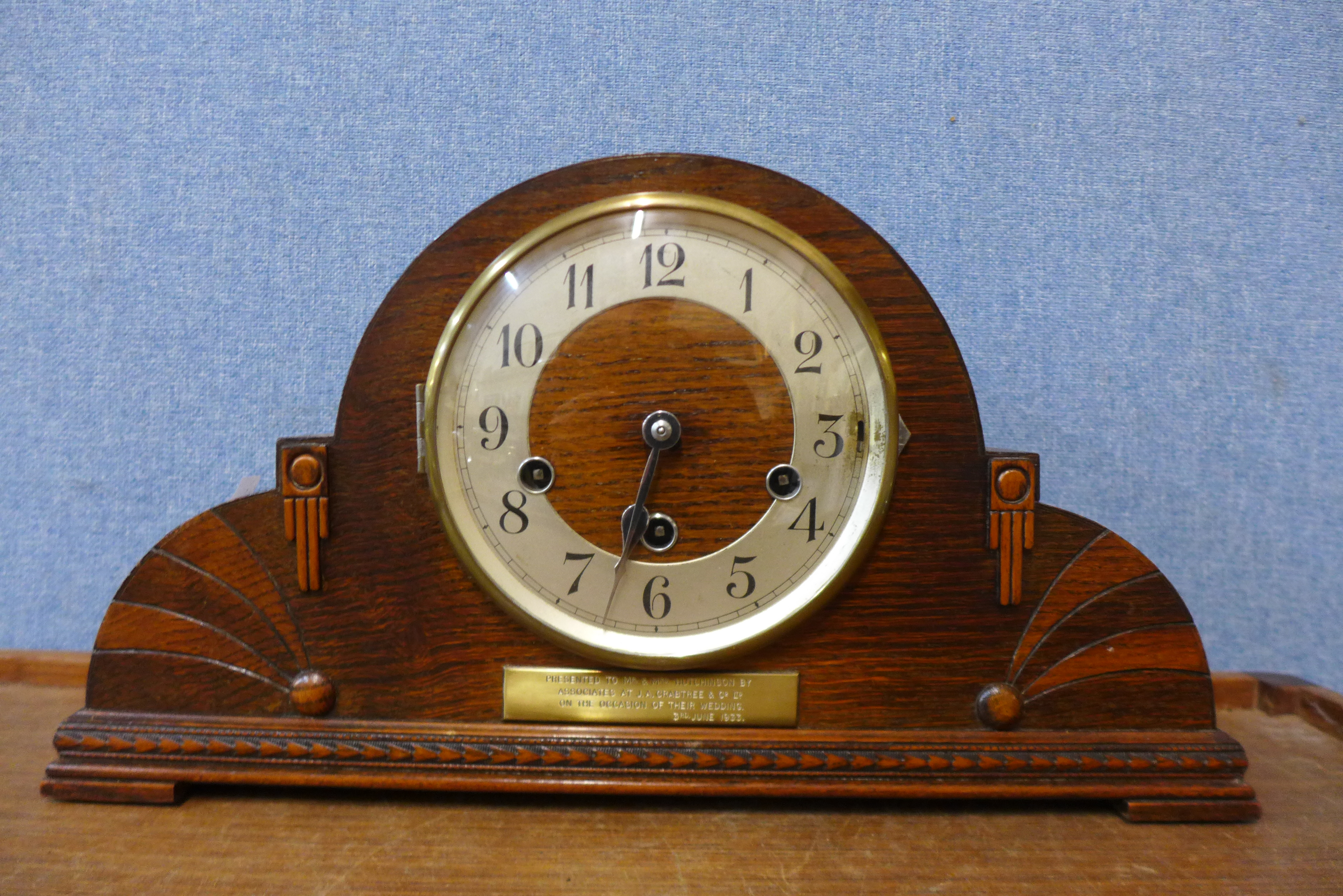 An Art deco oak mantel clock