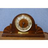 An Art deco oak mantel clock