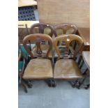 A set of four Victorian mahogany balloon back chairs