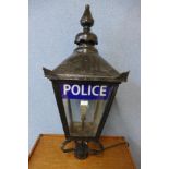 A cast iron lantern, bearing Police inscription to glass