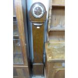 An Art Decko walnut dwarf long case clock