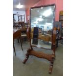 A Victorian mahogany cheval mirror