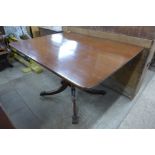 A George IV mahogany rectangular dining table