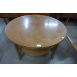A Nathan teak circular coffee table