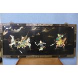 A Chinese black chinoiserie wall hanging plaque