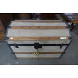 A beech, metal and suede mounted steamer trunk
