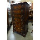 A Bevan Funnel mahogany fall front chest of drawers