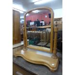 A Victorian pine toilet mirror