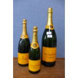 A set of three Veuve Clicquot Chamagne dummy display bottles