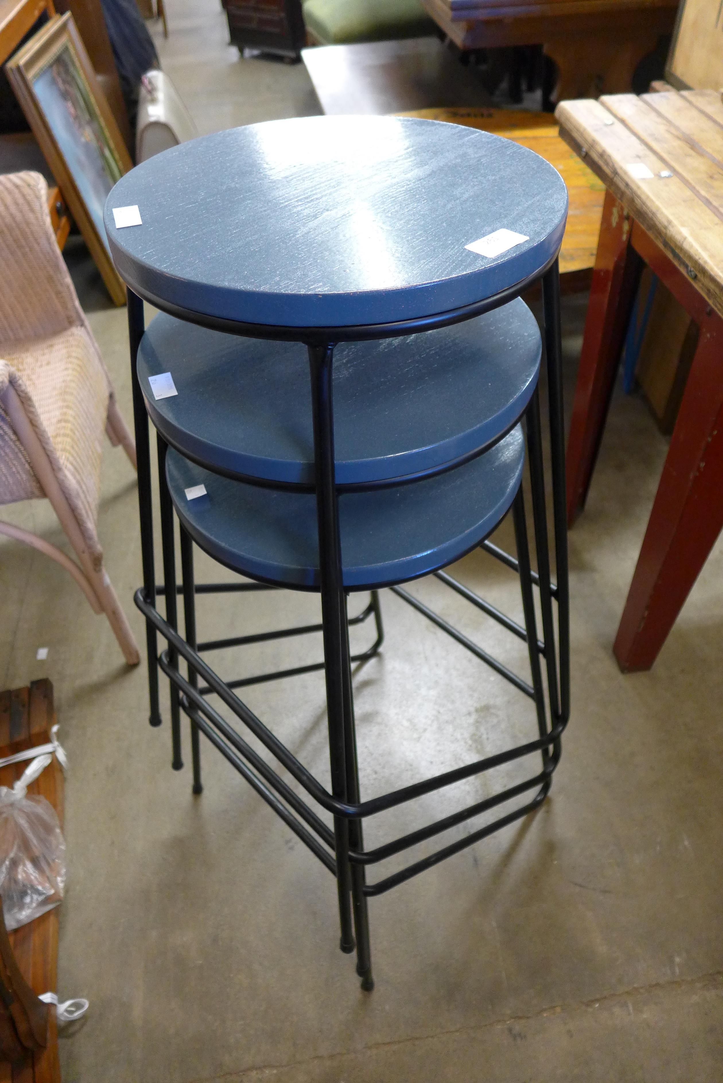 A set of three stacking stools