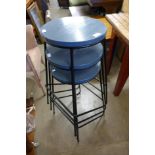 A set of three stacking stools