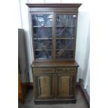 An Edward VII inlaid mahogany bookcase