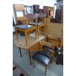 A teak drop-leaf table and four chairs