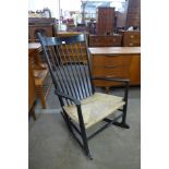 A Danish FDB ebonised J16 ebonised rocking chair, designed by Hans Wegner