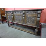 A Jacobean Revival carved oak dresser