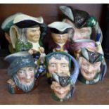 Three Robin Hood Royal Doulton character jugs, small, medium and large, one other large character