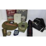 A collection of Lowland Regiment items including an armband, badges, stable belt and a silk cloth