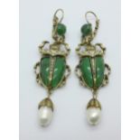 A pair of scarab earrings