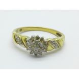 A 9ct gold diamond cluster ring with diamond shoulders, 2.2g, L