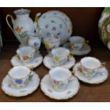 A Meissen flower six setting coffee service with coffee pot, cream, sugar and plate