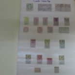 Stamps:- stock book of revenues and poster stamps, loose and on entires