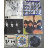 Four Beatles LP records comprising A Hard Day's Night, Revolver, With The Beatles and Beatles For