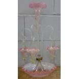 A Victorian pink and opaline uranium glass epergne with three hanging baskets, 54cm