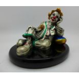 A Marcello Giorgio clown finished in sterling silver laminate and hand painted enamel, 17cm wide