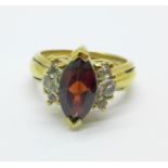 A silver gilt marquise garnet and zircon ring, M