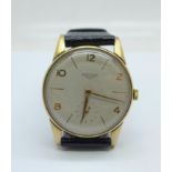 A 9ct gold Longines wristwatch, with Omega crown, 32mm case