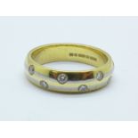 An 18ct gold and diamond ring, 6.2g, N