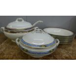 A Booths soup tureen with ladle and eight soup bowls, one bowl chipped and a Wedgwood tureen