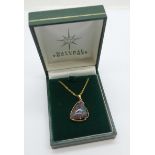 A 9ct gold pendant with large opal doublet on a plated chain