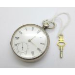 A silver Waltham pocket watch with key